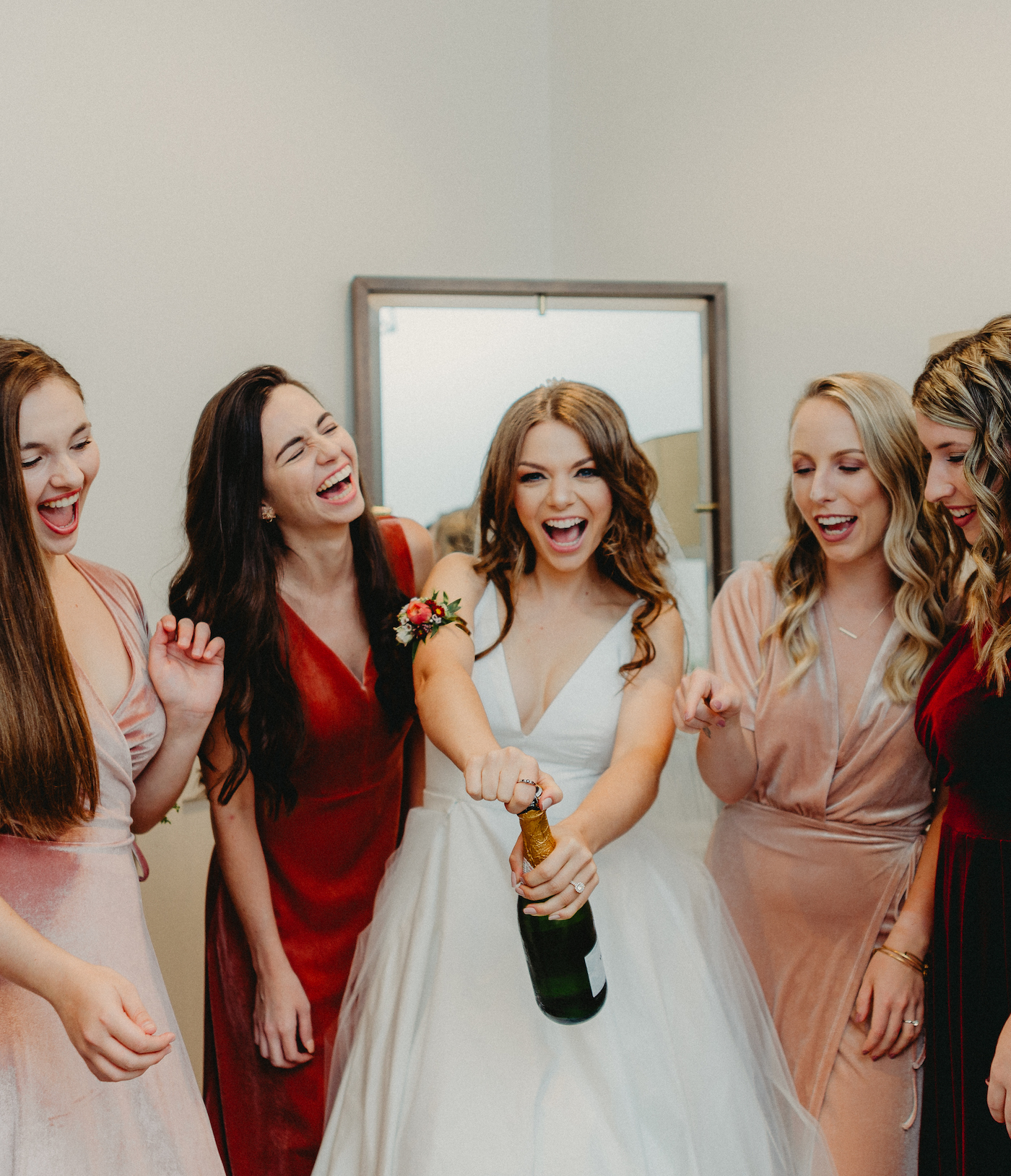 Bride and Bridesmaids Getting Ready and Popping Drinking Champagne | V Neck Bridal Gown Spaghetti Strap A Line Kate McDonald Ballgown