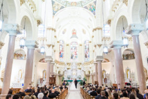 Florida Bride and Groom Exchanging Wedding Vows During Ceremony | Tampa Bay Traditional Wedding Venue Sacred Heart Catholic Church