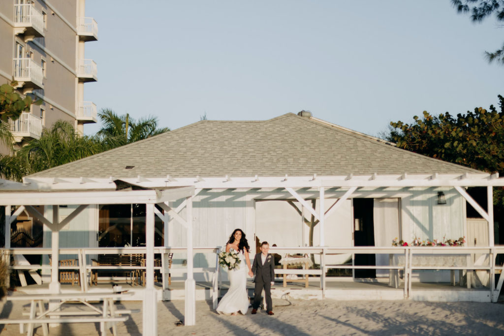 Bride and Step Son Walking Down Aisle | Tampa St Pete Florida COVID Destination Elopement Beach Wedding Ceremony