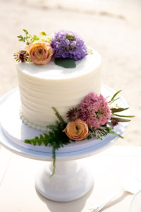 Intimate Elopement Wedding Cake, Small One Tier Top of Cake with Vibrant Bright Floral Embellishments | St. Petersburg Private Beachfront Wedding Venue Isla Del Sol | Florida Elopement Planner Elope Tampa Bay