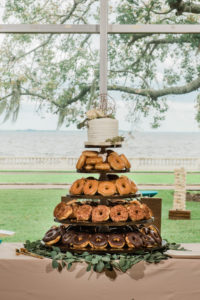South Tampa Brunch Wedding Donut Tower Display Chocolate Glazed and Maple Bacon Donuts | One Small Single Tier Buttercream Wedding Cake with Gold Geometric Name Topper and Eucalyptus Greenery