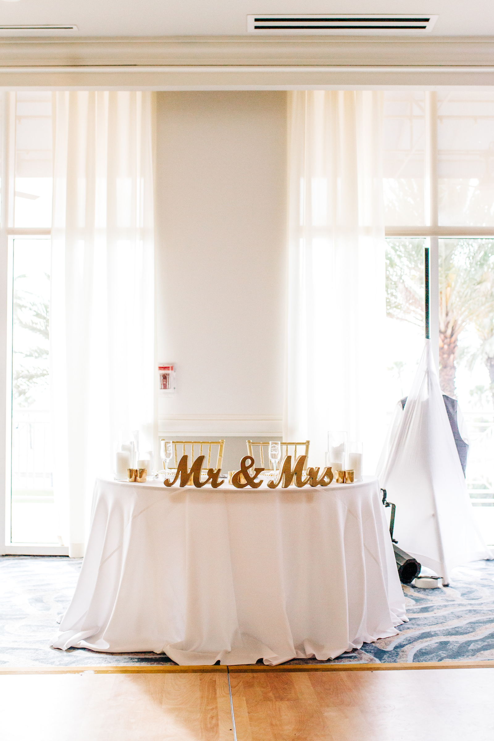 Florida Modern Minimal Wedding Reception and Decor, Sweetheart Table with Gold Mr. and Mrs. Table Letters | Clearwater Beach Wedding Planner Special Moments Event Planning | Florida Wedding Venue and Resort Hyatt Regency Clearwater Beach, Bellaire Ballroom