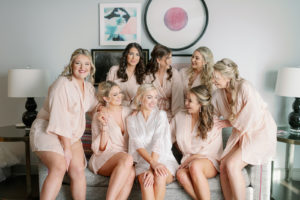 Tampa Bay Bride and Bridal Party Getting Ready, Bridesmaids Wearing Matching Blush Pink Silk Robes | Florida Wedding Venue and Historic Resort The Renaissance Vinoy in Downtown St. Petersburg