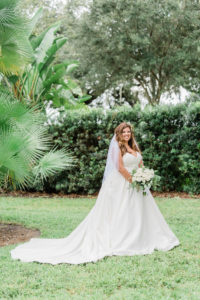 Outdoor Bridal Portrait in South Tampa | Ivory Private Collection Simple Classic Sweetheart Neckline Strapless A Line Wedding Dress Bridal Gown with Pockets by Truly Forever Bridal Tampa | Eucalyptus Greenery and White Rose Bridal Bouquet