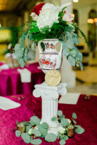 Clearwater Florida Disney Fairy Tale Wedding Reception Centerpiece Hercules Column with Greek Vase filled with White Hydrangea and Blush Pink and Red Roses and Greenery