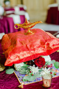 Clearwater Florida Disney Fairy Tale Wedding Reception Centerpiece Aladdin Magic Carpet and Pillow with Genie Lamp