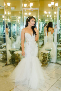 Mermaid Fitted Lace Sweetheart Wedding Gown with Tulle Skirt and Sheer Illusion Panels from Tampa Dress Shop Isabel Oneil Bridal Collection