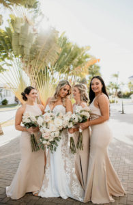 St. Petersburg Bride in Romantic Sweetheart V Neck Lace and Illusion Spaghetti Strap Wedding Dress Holding Lush White, Ivory and Blush Pink Roses and Eucalyptus Floral Bouquet, Bridesmaids in Beige Matching Dresses