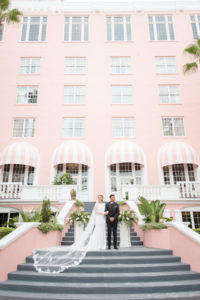 Classic Bride and Groom on Steps of St. Petersburg Historic Wedding Venue The Pink Palace, Don Cesar | Styled Shoot