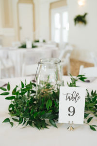 Tampa Bay Modern Minimalist Wedding Reception and Decor, Round Tables with Dusk Linens, Low Centerpieces with Greenery and Candles, Simple Script Table Number, St. Petersburg Women's Club | Tampa Bay Day of Coordinator Special Moments Event Planning