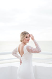Classic Bride in Low Open V Back Wedding Dress with Lace Long Sleeves Wedding Portrait | Tampa Bay Wedding Dress Shop Truly Forever Bridal | St. Petersburg Waterfront Historic Wedding Venue Pink Palace, Don Cesar | Styled Shoot
