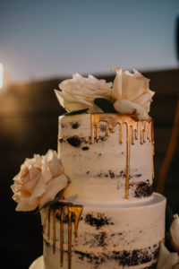 Semi Naked Three Tier Wedding Cake with Gold Drizzle Adorned with Blush Pink Roses | Tampa Bay Wedding Cake Baker The Artistic Whisk