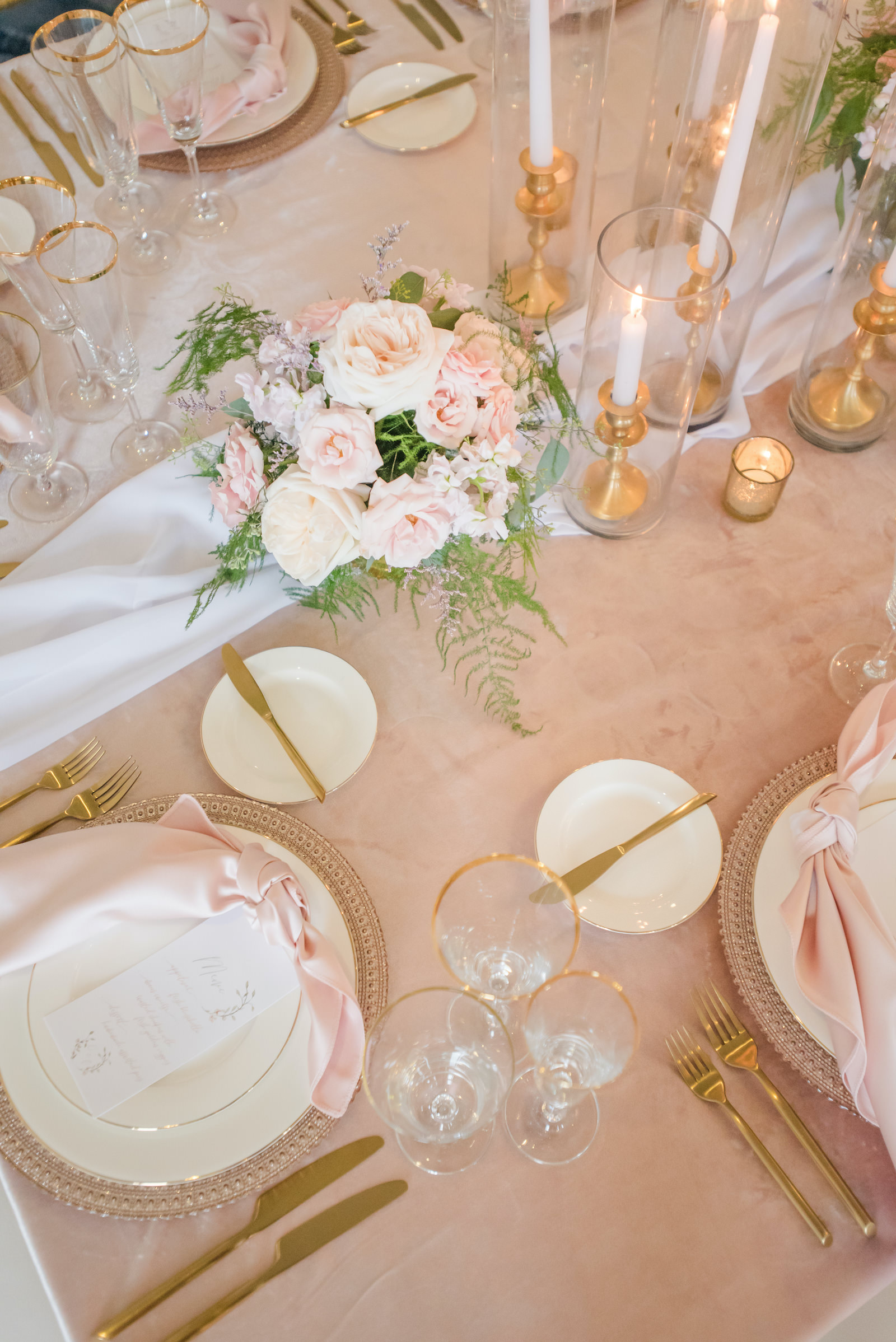 Romantic Classic Wedding Reception Decor, Blush Pink Linen, Gold Silverware, White Table Runner, Pastel Floral Centerpiece with Ivory and Pink Roses, Greenery and Lilac Flowers, Gold Candlesticks | Tampa Bay Wedding Planner Elegant Affairs by Design | Table Design Kate Ryan Event Rentals | Don Cesar Styled Wedding