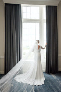 Classic Bride in Full Length Veil Wearing Dress from Tampa Bay Dress Shop Truly Forever Bridal | Don Cesar Styled Wedding
