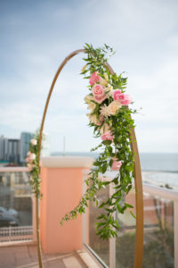Elegant Modern Gold Circular Arch with Greenery and Pink and Ivory Floral Arrangements | Tampa Bay Wedding Planner Coastal Coordinating | Wedding Photographer Carrie Wildes