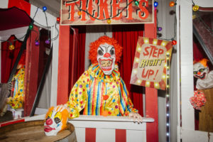 Creepy Halloween Wedding Decor, Carnival Ticket Booth with Scary Clown | Tampa Bay Wedding Planner UNIQUE Weddings and Events