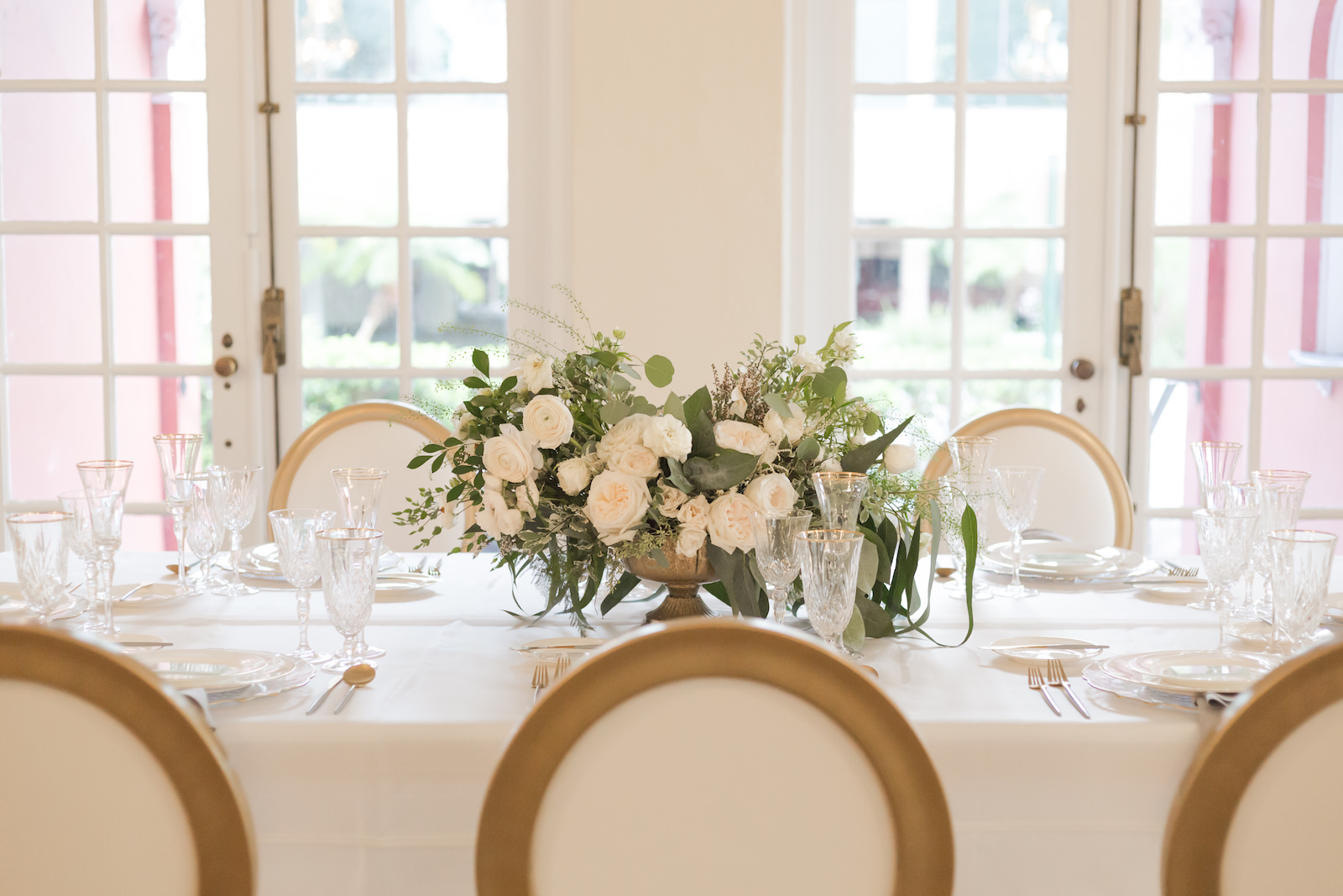 Southern Charm classic and timeless lush ivory roses, eucalyptis and greenery low floral centerpiece | Tampa Bay wedding planner and design Elegant Affairs by Design | Kate Ryan Event Rentals