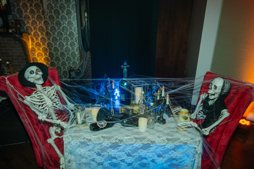 Creepy Halloween Wedding Reception Decor, Two Skeletons Covered in