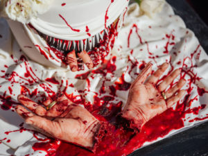 Gory and Creepy Halloween Wedding Cake with Scary Mouth, Razor Sharp Teeth and Red Blood Splatter, Severed Bride and Groom Hands | Tampa Bay Wedding Cake Baker The Artistic Whisk