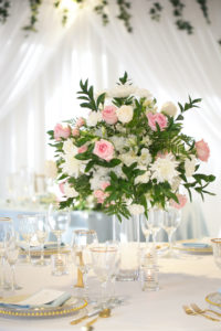 Elegant Modern Wedding Reception Decor, White Draping, Lush Pink and White Florals with Greenery Centerpiece, Gold Beaded Chargers and Flatware | Tampa Bay Wedding Photographer Carrie Wildes | Wedding Planner Coastal Coordinating | Wedding Rentals Outside the Box | Wedding Florist Brides N Blooms