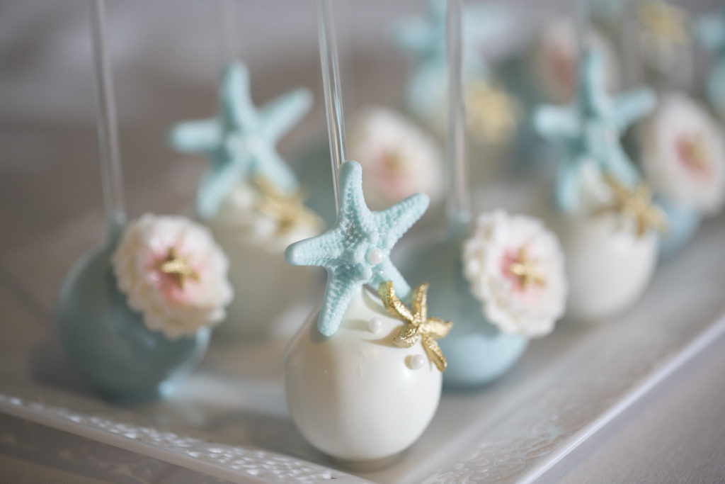 Elegant Beach Themed Wedding Desserts, Blue and White Cake Pops with Starfish Embellishments | Tampa Bay Wedding Desserts Sweetly Dipped Confections | Tampa Bay Wedding Photographer Carrie Wildes