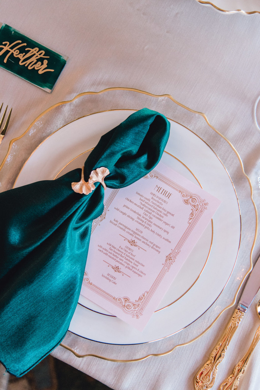 Emerald Green Napkin on Gold Rimmed Charger and Flatware | Tampa Bay Wedding Planner EventFull Weddings | Kate Ryan Event Rentals
