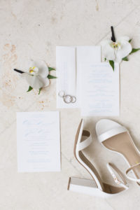 Classic white and dusty blue print wedding invitation, white orchids, white sandal block heel wedding bridal shoes