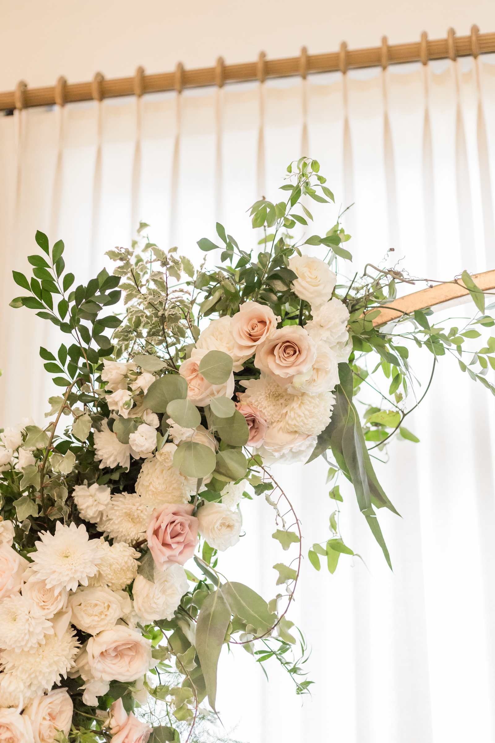 Classic and timeless lush white, blush pink roses floral arrangement, eucalyptus and greenery | Tampa Bay wedding planner and designer Elegant Affairs by Design