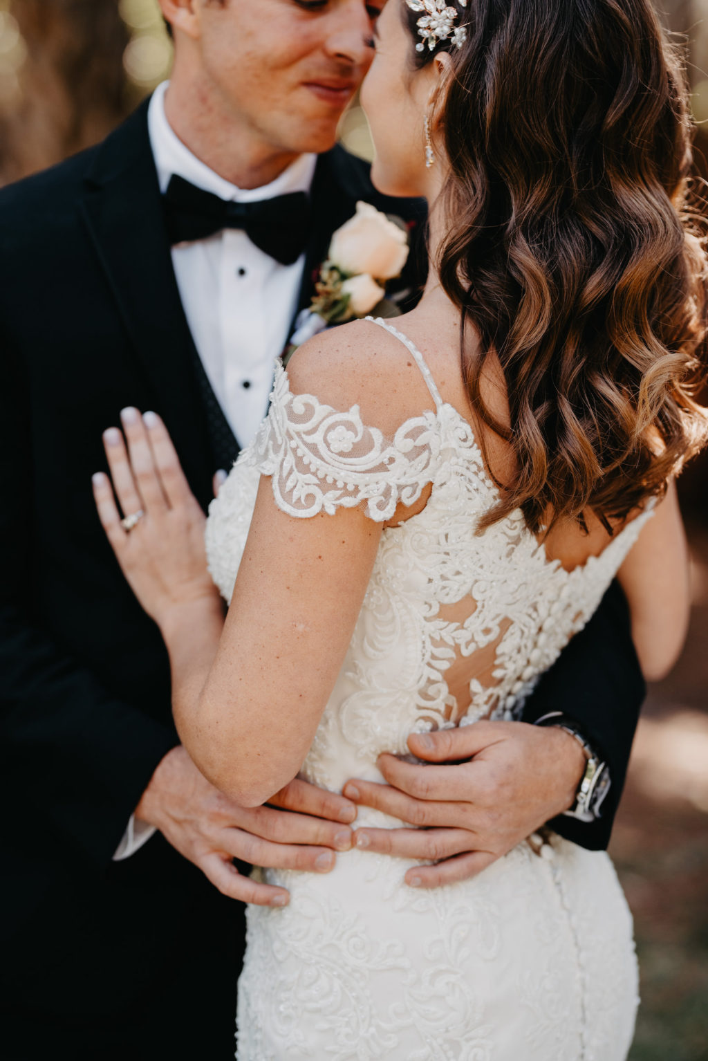 Romantic Bride and Groom Photo, Bride Wearing Lace and Illusion Cap Sleeve Maggie Sottero Wedding Dress, Groom in Classic Black Tuxedo | Tampa Bay Wedding Hair and Makeup Michele Renee the Studio