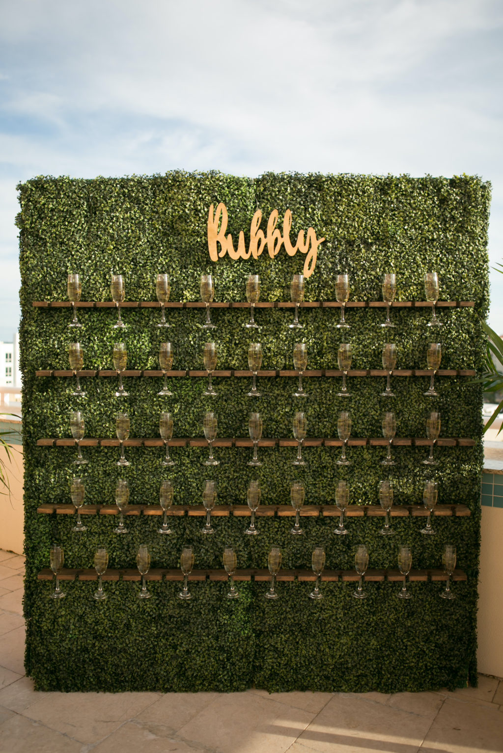Champagne Wall Outside the Box Event Rentals