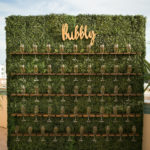 Champagne Wall Outside the Box Event Rentals