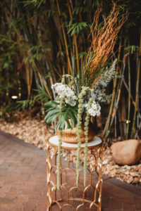 Modern Tropical Inspired Florida Wedding Ceremony in Bamboo Garden, DIY Floral Centerpieces with Bronze Base and Greenery | Downtown St. Pete Historic Wedding Venue NOVA 535 - Courtyard