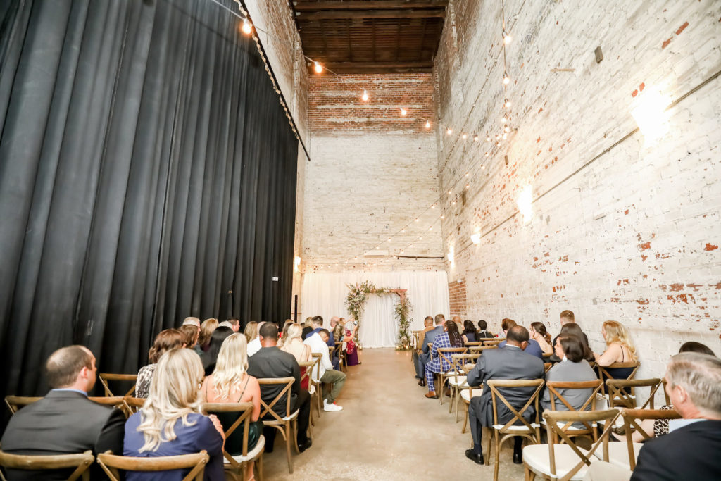 Boho whimsical wedding ceremony at Tampa Wedding venue Rialto Theatre | Wedding planner UNIQUE Weddings and Events | Rentals A Chair Affair | Over the Top Rental Linens | Tampa Bay wedding photographer Lifelong Photography Studio