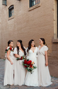 Outdoor Street Bride and Bridesmaids Portrait | Downtown Tampa Heights Christmas Wedding | Long Sleeve Lace Plunging V Neck Tulle Ballgown Wedding Dress Bridal Gown with Long Cathedral Veil | Champagne Long Chiffon Bridesmaids Dresses | Red Burgundy and Gold Rose Bridal Bouquet | Dewitt for Love Photography