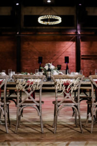 Custom Wedding Seat Signs "My Sun and Stars" "Moon of my life" on Back of Crossback Chairs at Armature Works The Gathering Reception Room | Florida Day of Wedding Coordinator Special Moments Event Planning | Tampa Bay Wedding Photographer Lifelong Photography Studio
