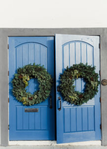 Tampa Christmas Wedding Entrance Blue Doors with Winter Greenery Pine Fir Wreaths with Pine Cones
