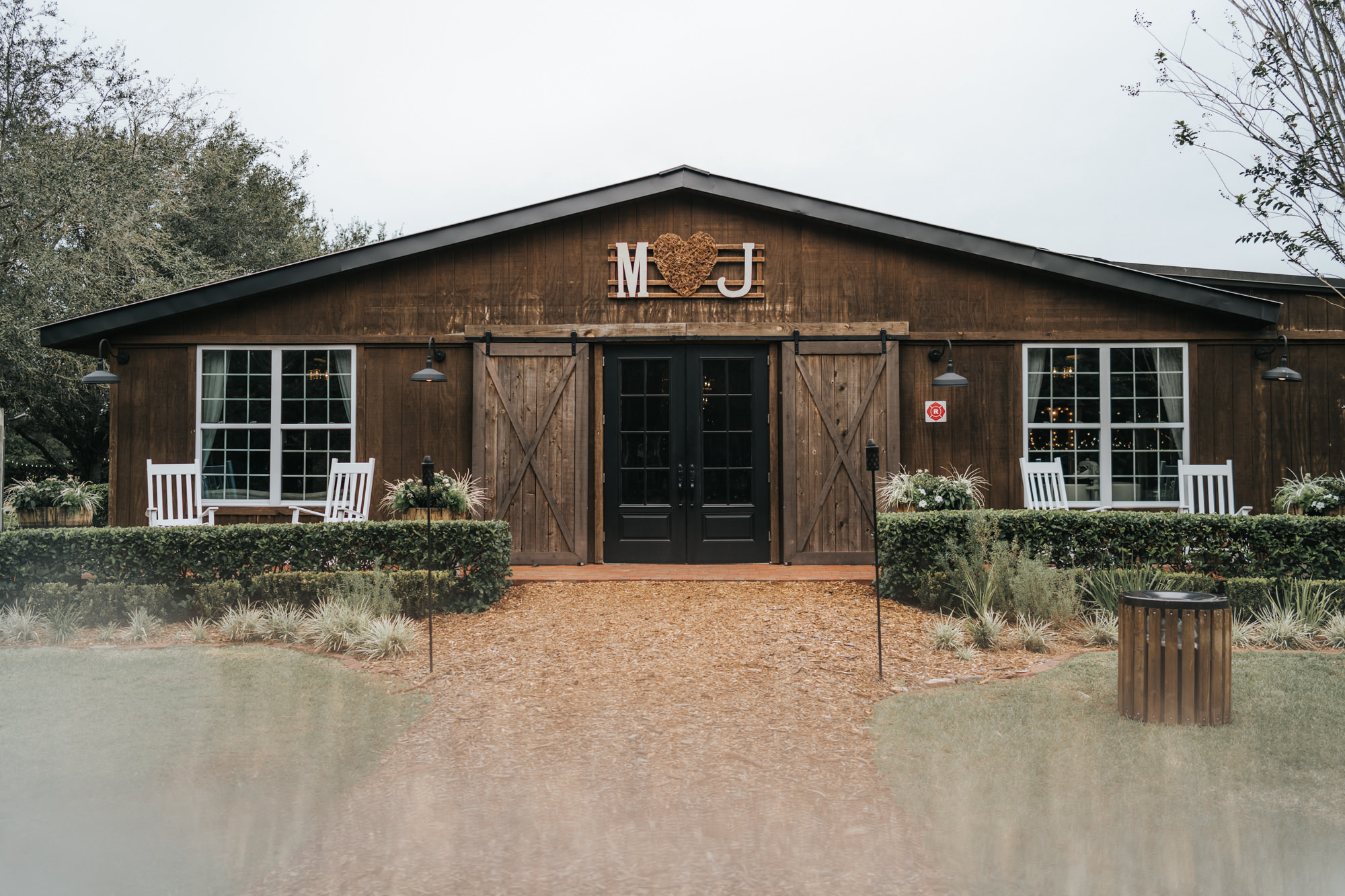 Rustic Dover Wedding Farm Barn Ranch Reception with Bride and Groom Monogram Letters over Barn Doors