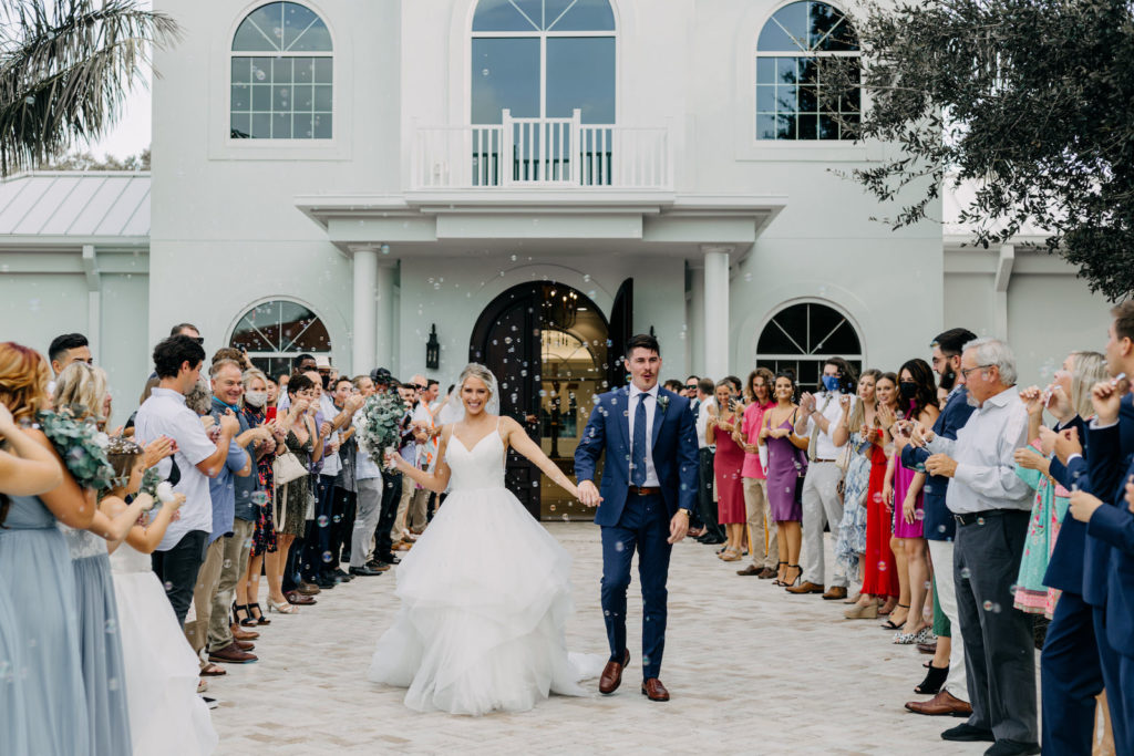 Classic Bride and Groom Bubble Exit Wedding Ceremony | Tampa Bay Wedding Photographer Amber McWhorter Photography | Safety Harbor Wedding Venue Harborside Chapel
