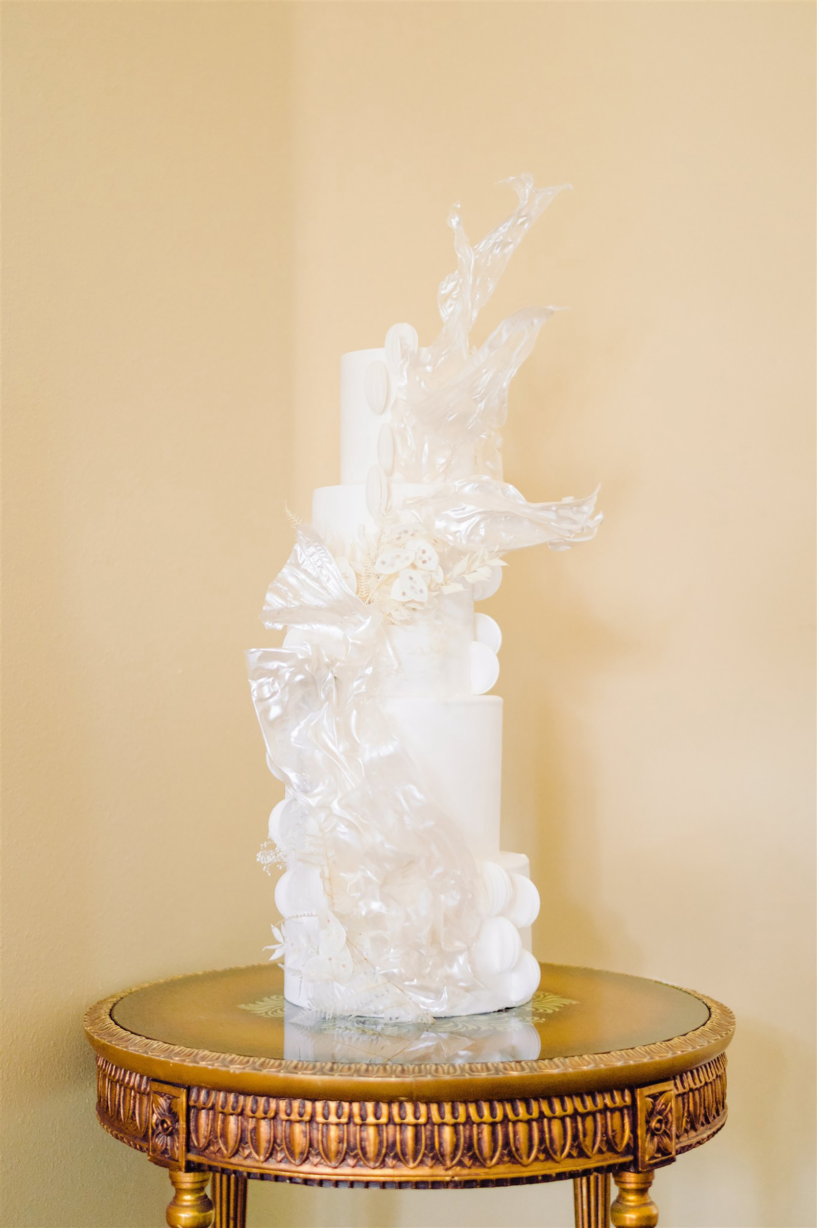 Modern All White Wedding Cake with Sugar Sculpture from Tampa Bay Baker The Artistic Whisk