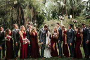 St. Petersburg Wedding Party, Bridal Bouquet with Exotic Tropical Inspired Flowers, White, Dark Purple, Burgundy, Wine Florals with Greenery, Bridesmaids in Long Mismatched BHLDN Dresses in Dark Burgundy and Wine Color | Florida Wedding Florist Posies Flower Truck | Tampa Bay Wedding Planner John Campbell Weddings