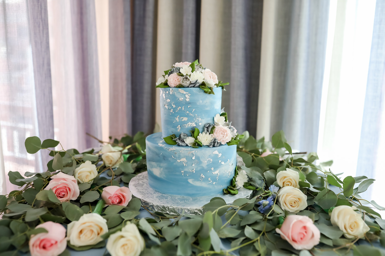 Two Tier Blue Marble Wedding Cake with Blush Pink and Grey and White Sugar Flowers | Wedding Cake Table with Eucalyptus Greenery and White and Blush Pink Roses