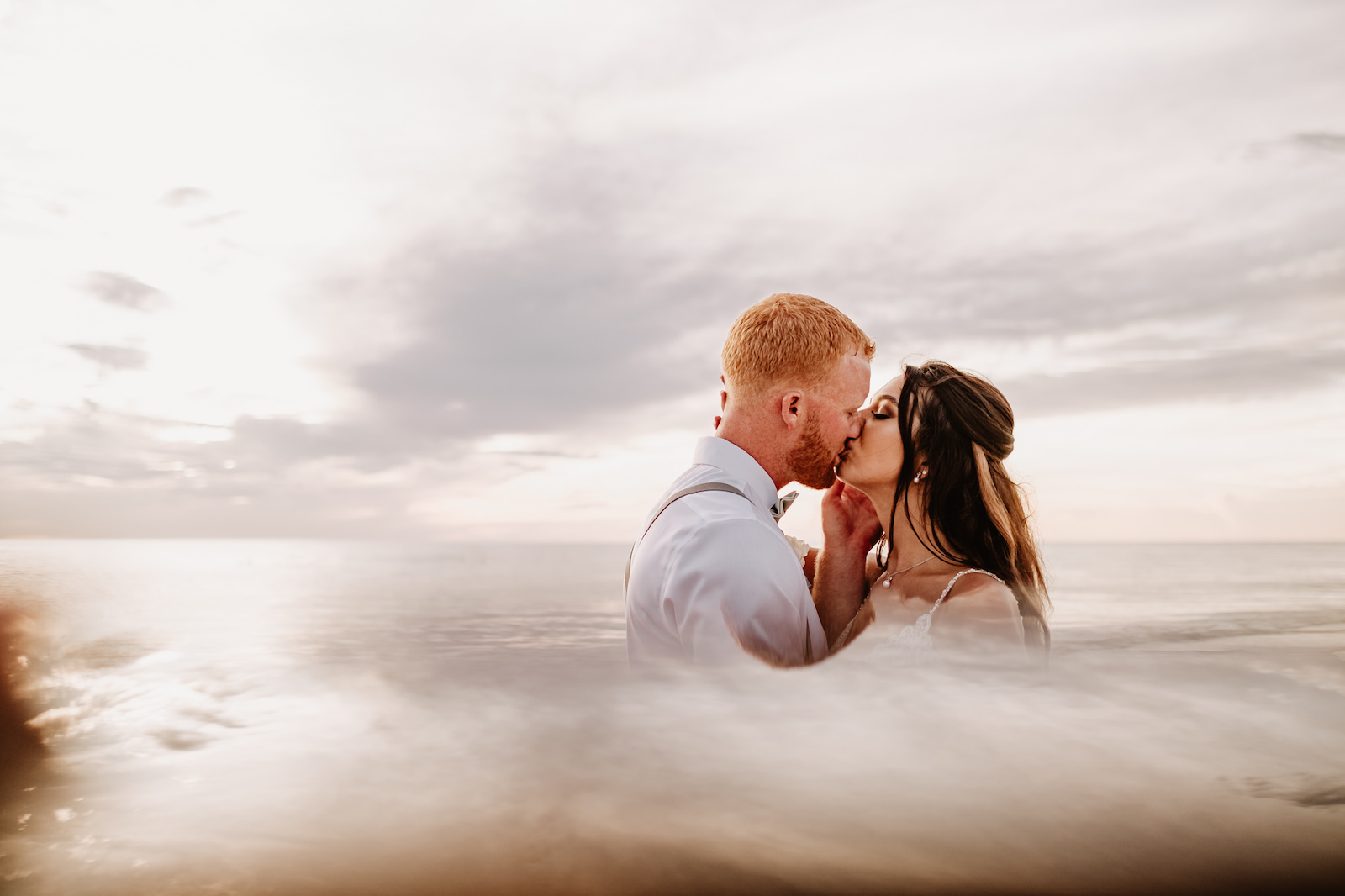 Outdoor Bride and Groom Sunset Portrait at Wedding Venue Hilton Clearwater Beach