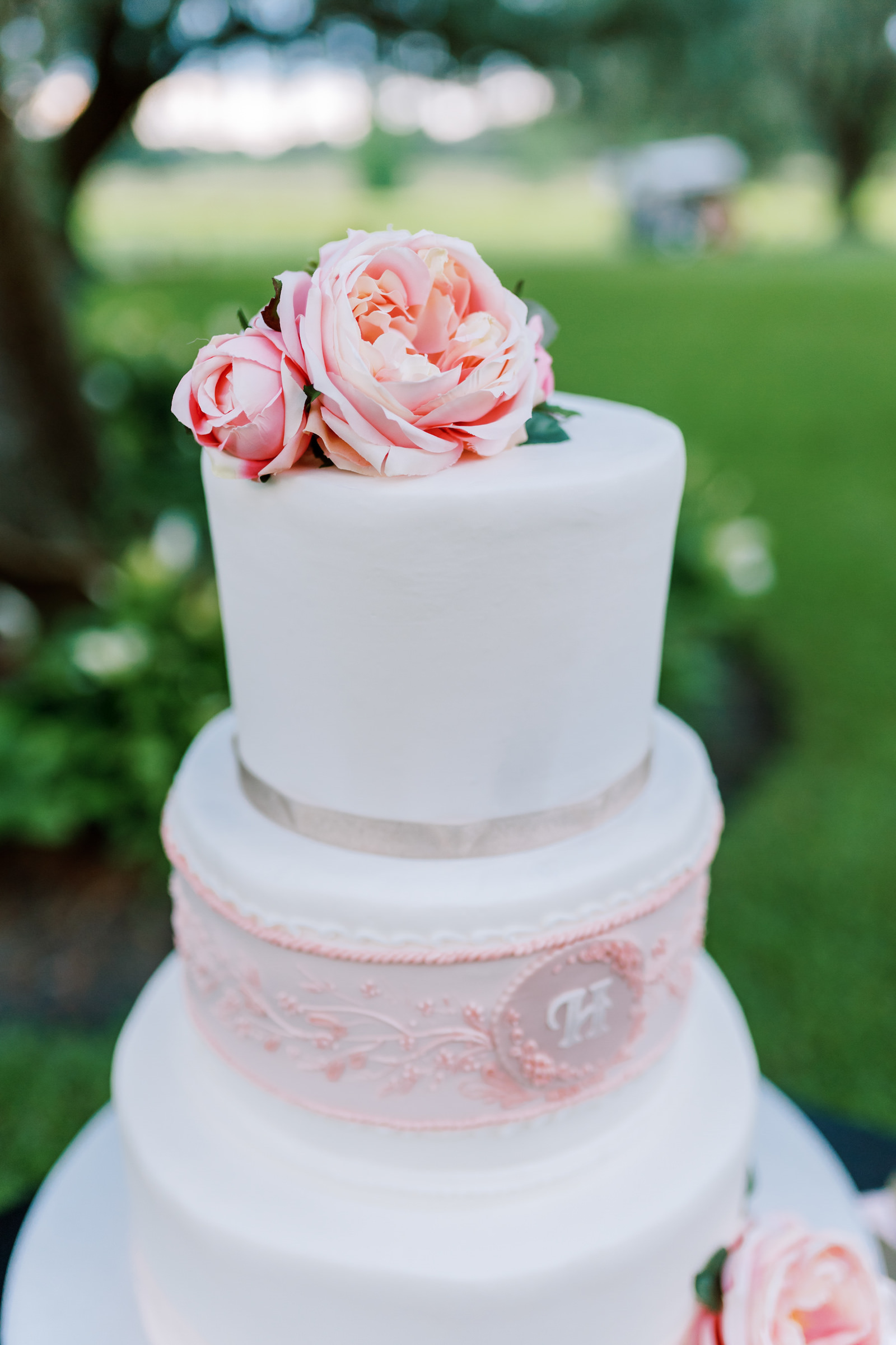 Round Three Tiered White Round Wedding Cake with Monogram Pink Design with Pink Roses