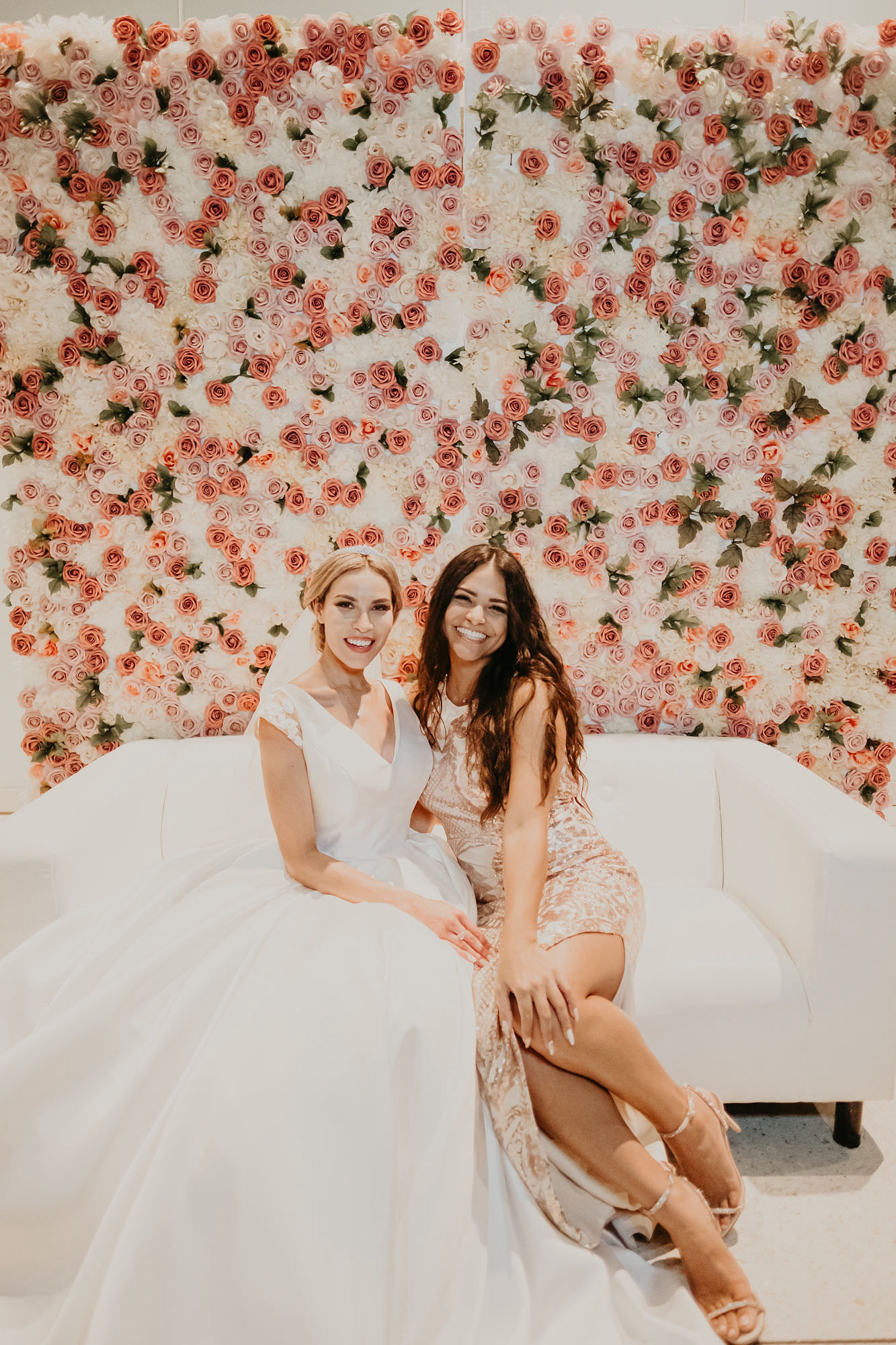 Wedding Floral Flower Wall Backdrop of White and Pink Roses with White Loveseat Photo Op | V Neck Mikado Satin Custom Ballgown Wedding Dress by Anomalie