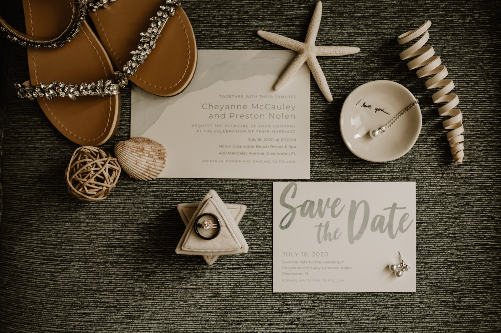 Coastal Beach Wedding Invitation Flat Lay with Silver Grey Font Stationery and Sea Shells Starfish