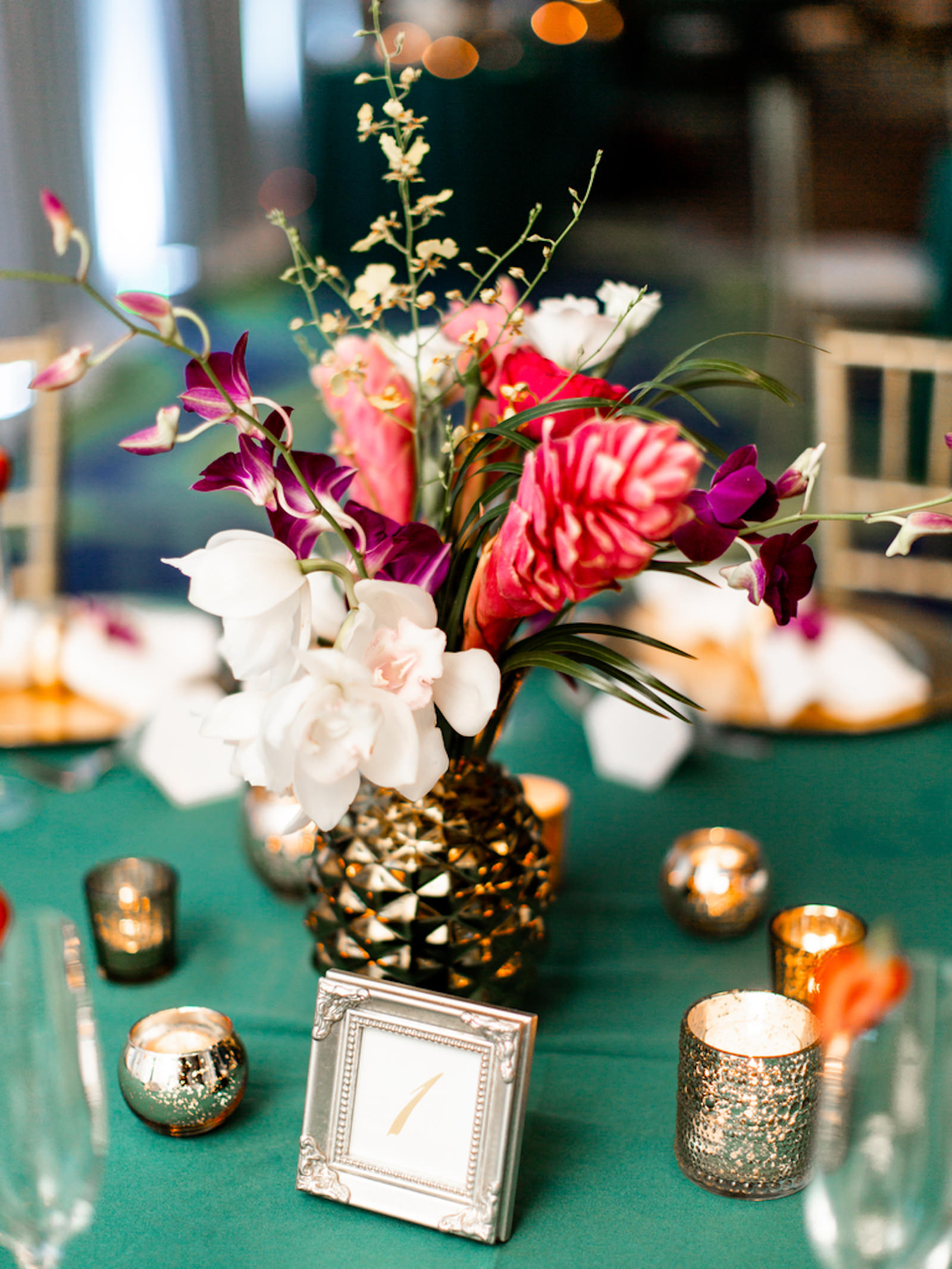 Tropical Elegant Wedding Reception Decor, Teal Tablecloth, Gold Painted Pineapple with Pink Ginver, White and Purple Flowers, Gold Mercury Candles | Tampa Bay Wedding Planner Special Moments Event Planning | Clearwater Beach Opal Sands Resort