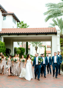 Wedding Party Outdoor Portrait at Tampa wedding Venue Westshore Yacht Club | Lace Strapless Sweetheart Scalloped Edge Train Wedding Dress Bridal Gown | Groom and Groomsmen Wearing Classic Navy Suit | Long Chiffon Taupe Champagne Neutral Bridesmaid Dresses by Lulu's | Dewitt for Love Photography
