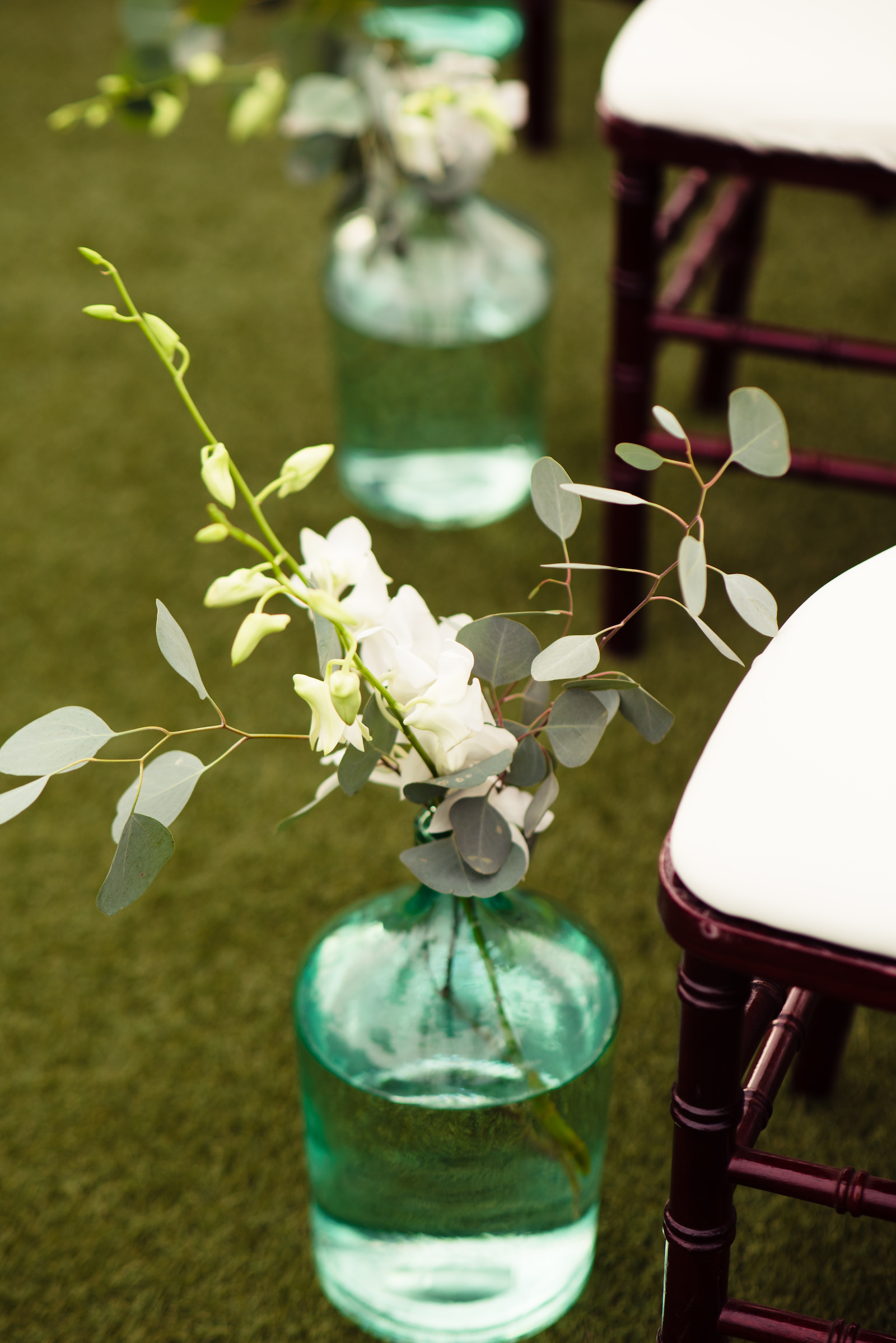 Minimal Elegant Wedding Ceremony Decor, Sea Green Vase with Silver Dollar Eucalyptus, White Flowers | Tampa Bay Wedding Planner Perfecting the Plan | Wedding Florist Iza's Flowers