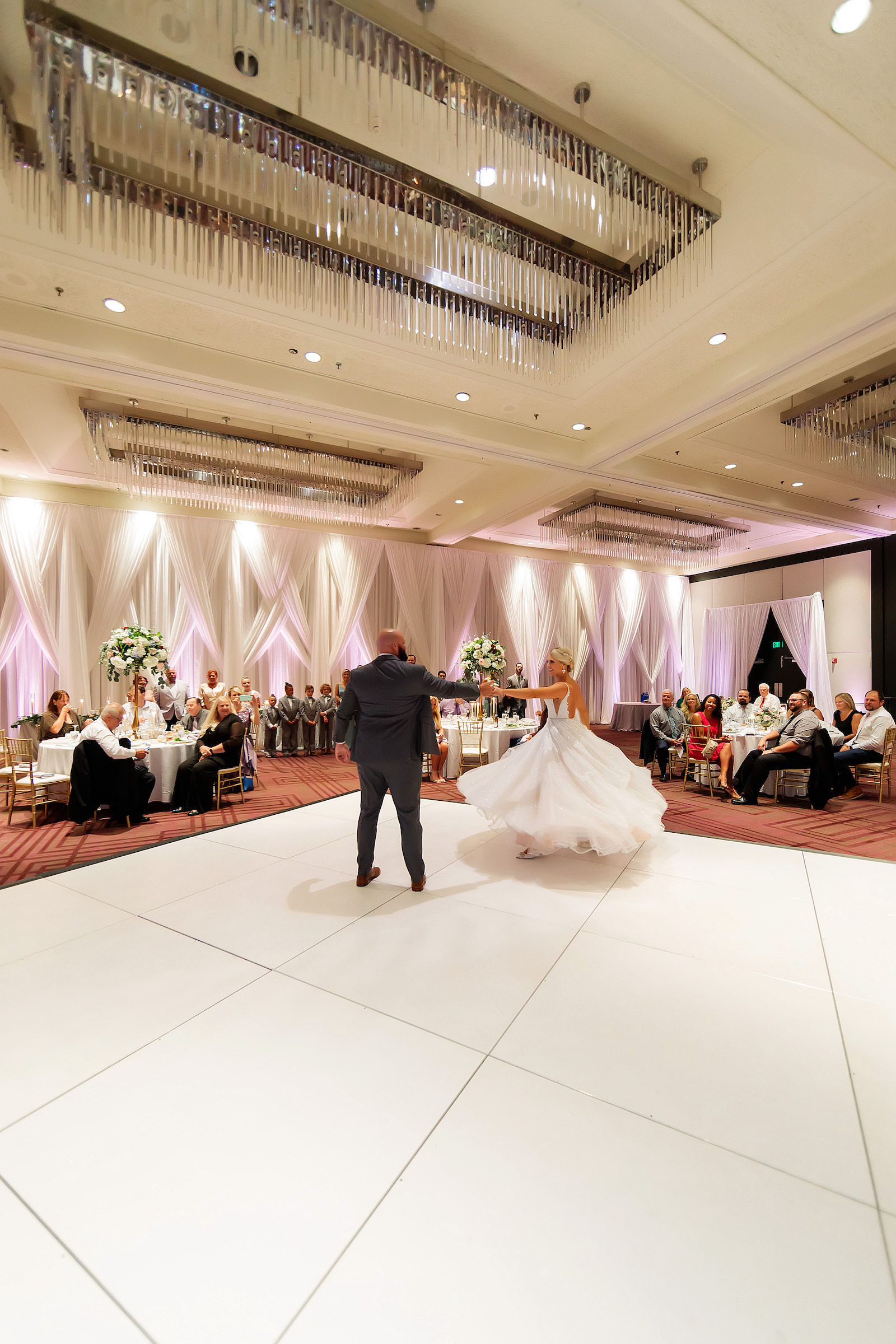Bride and Groom First Dance on White Dance Floor at Tampa Wedding Venue Hilton Tampa Downtown