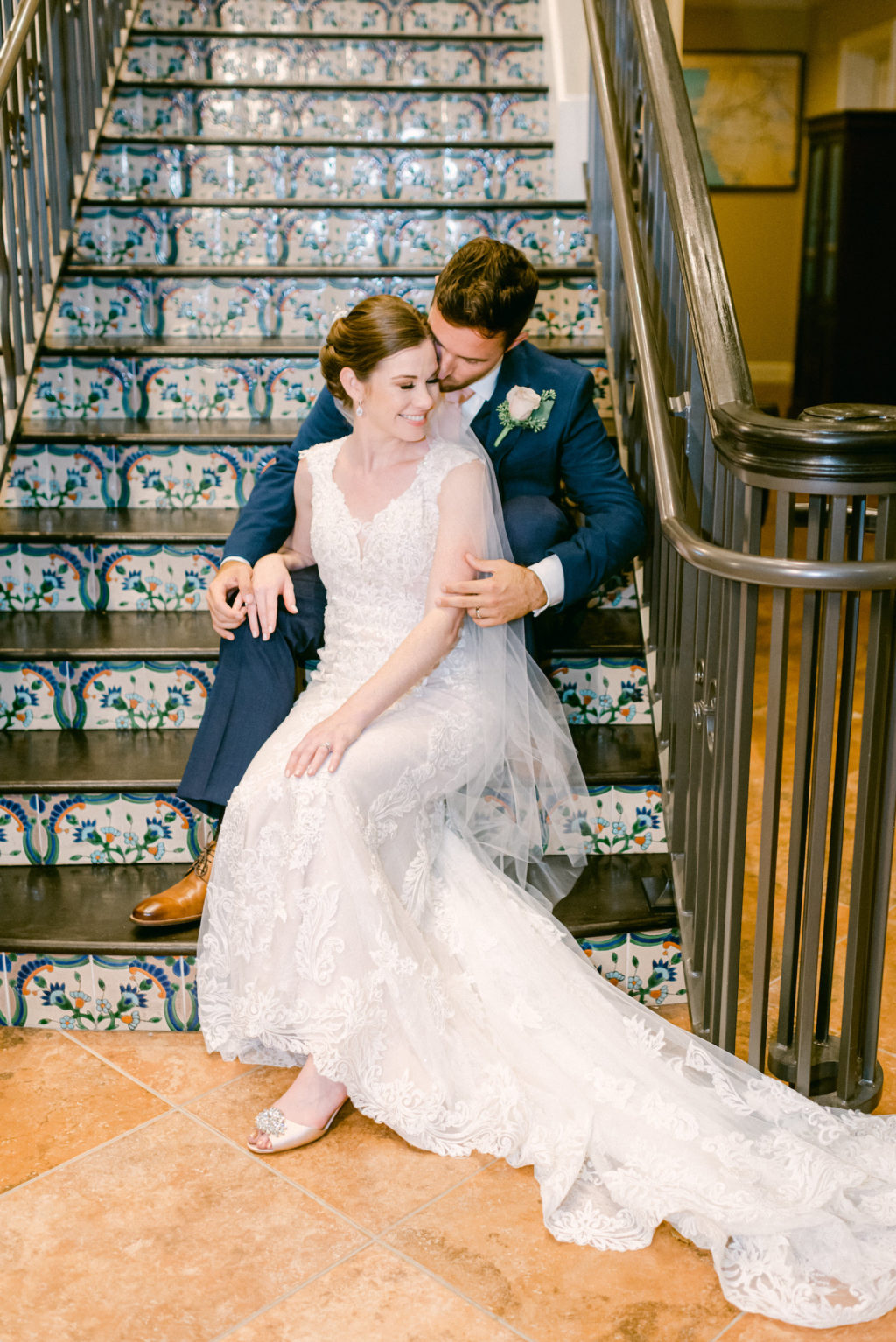 Tampa Bride and Groom Sitting on Fun Colorful Staircase